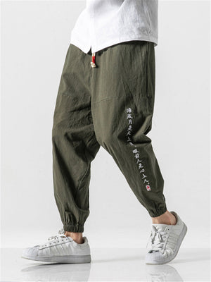 Embroidered Solid Color Ankle Banded Pants