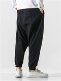 Embroidered Solid Color Ankle Banded Pants